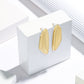 Gilded Serenade Earrings – High-Gloss Luxe Finish